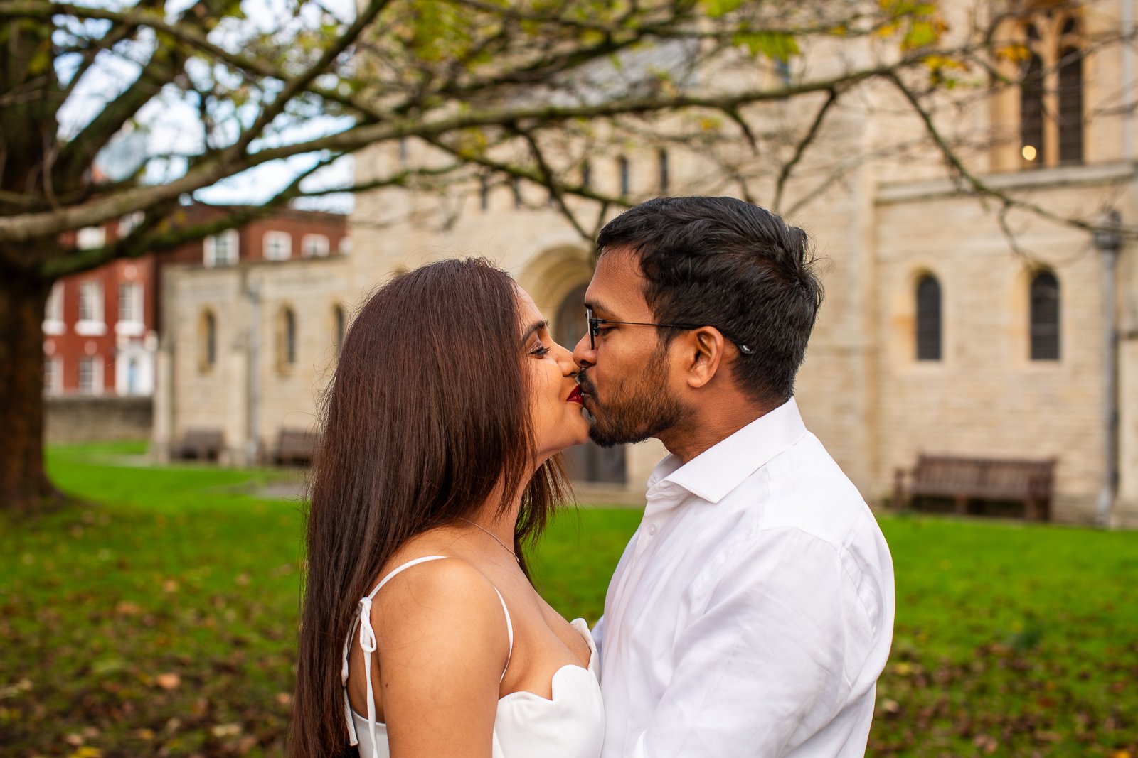 Couple kiss in a public park in Old Portsmouth